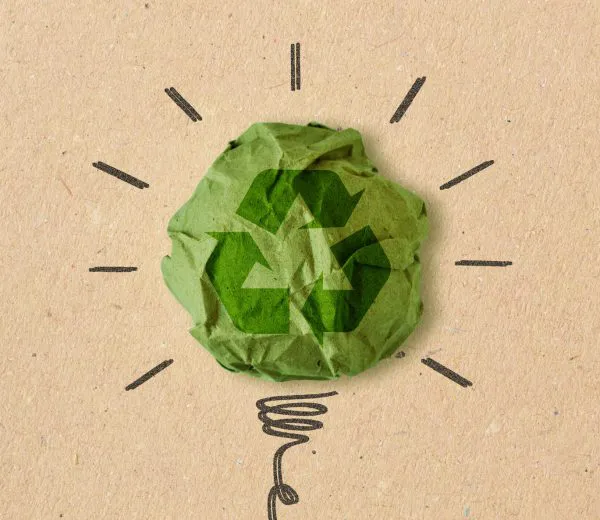 lightbulb drawing with a recycling icon